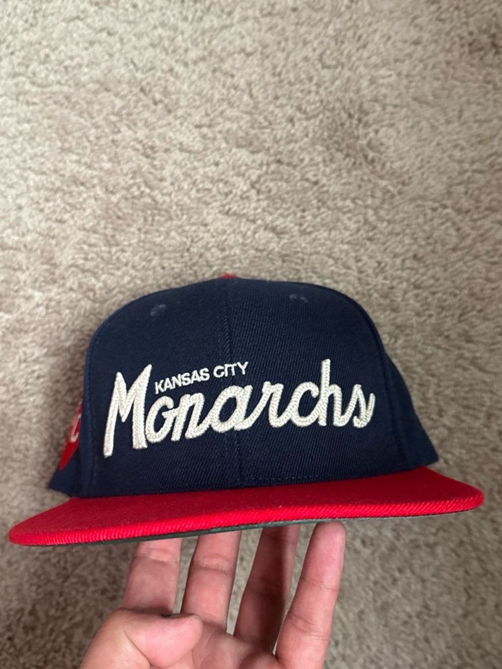 Rings & Crens Kansans City Monarach snapback baseball hats.
